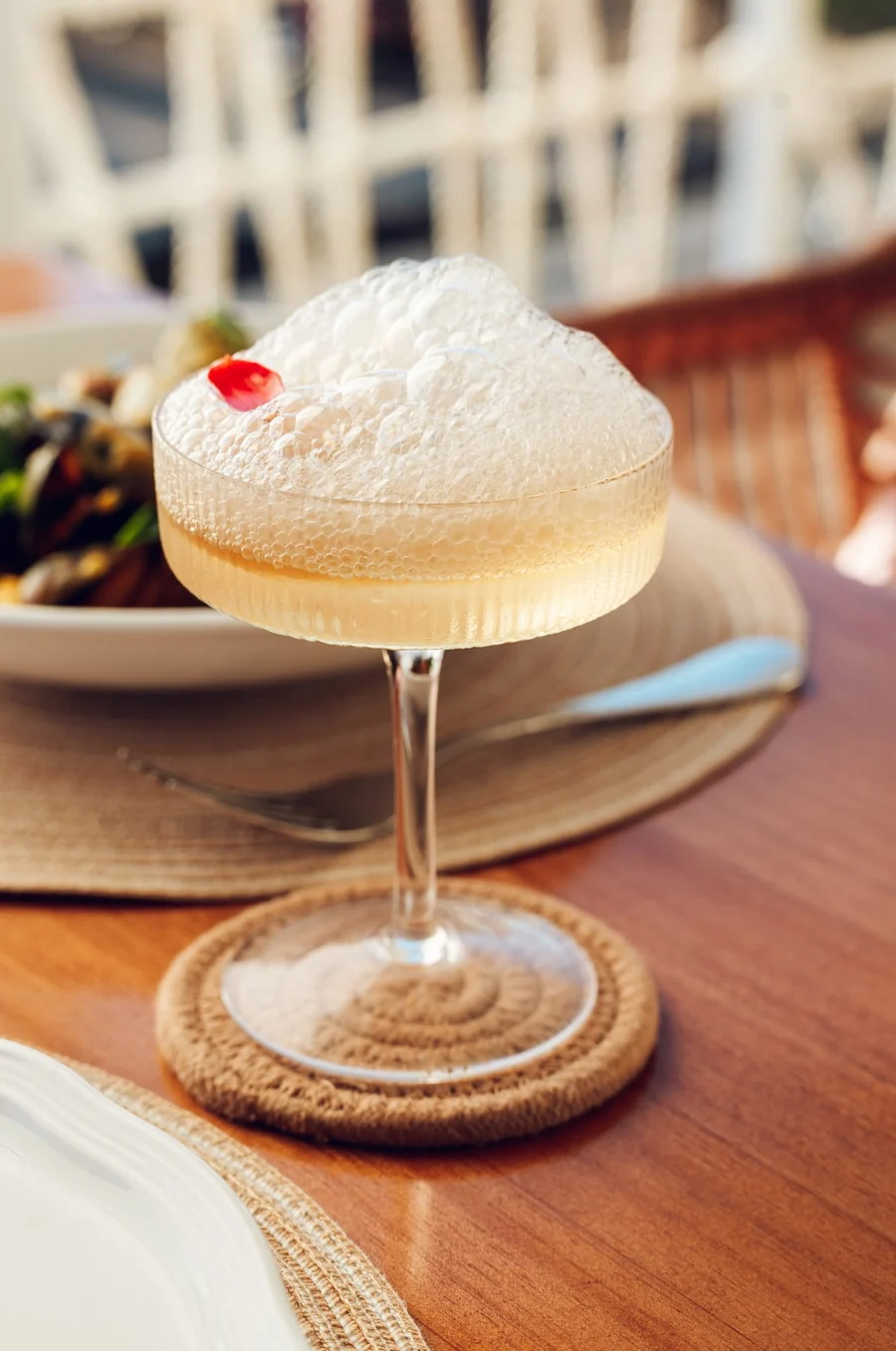 A cocktail with a foam top