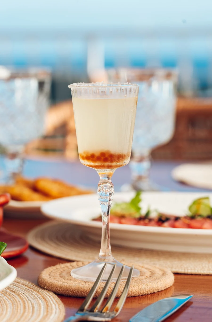 A cocktail with garnish